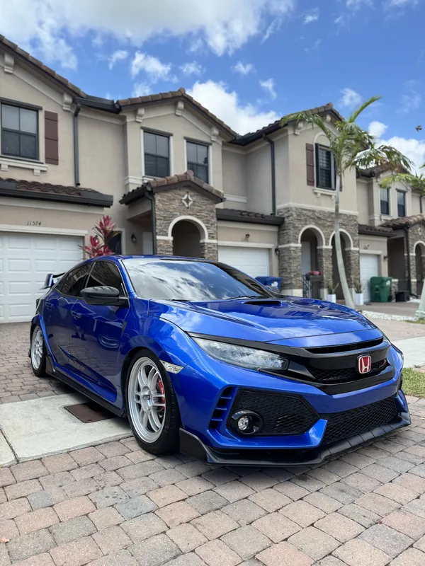 Blue Honda Civic Type R with a mirror-gloss finish after detailing